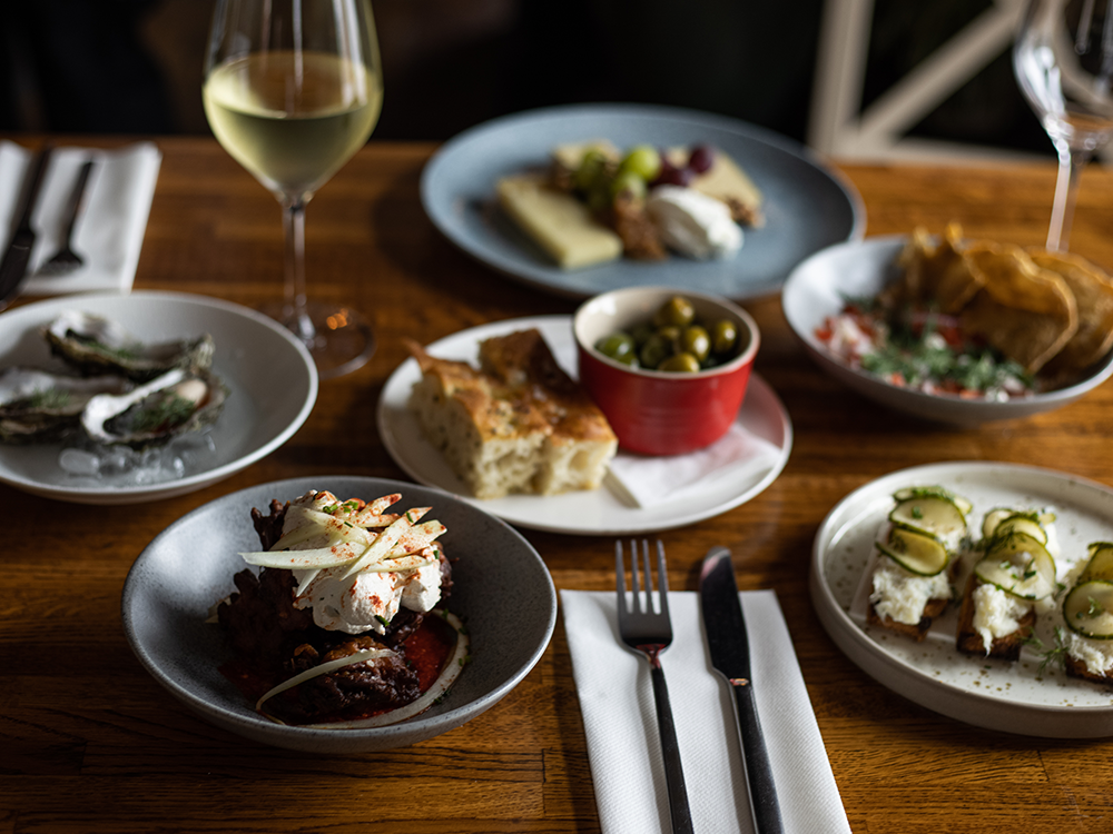 Selection of food on a restaurant table in Galway