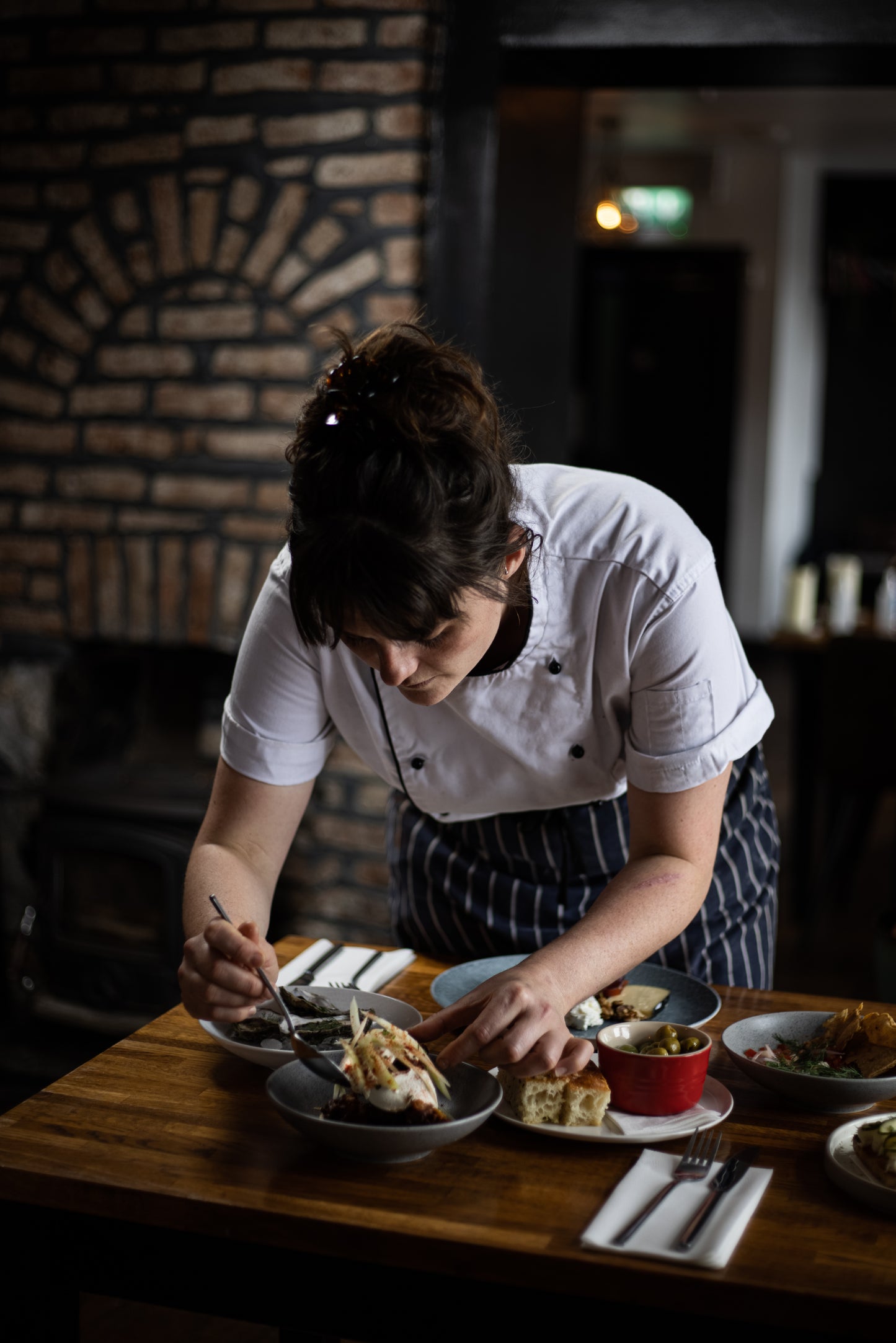 Chef plating food in Ruibin restaurant in Galway